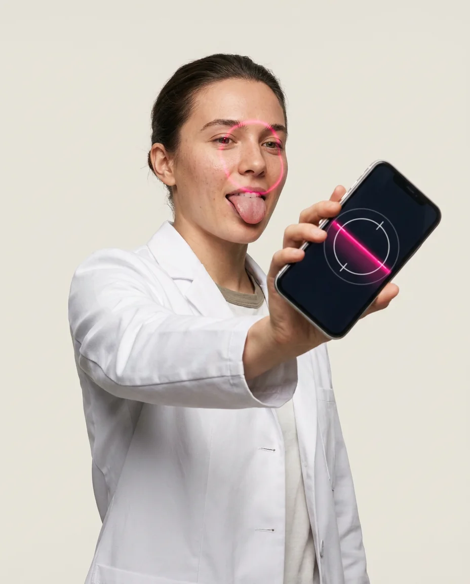 A person sticking their tongue out at a phone running the Super Candy scanner